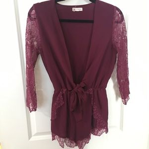 Burgundy romper with lace detail